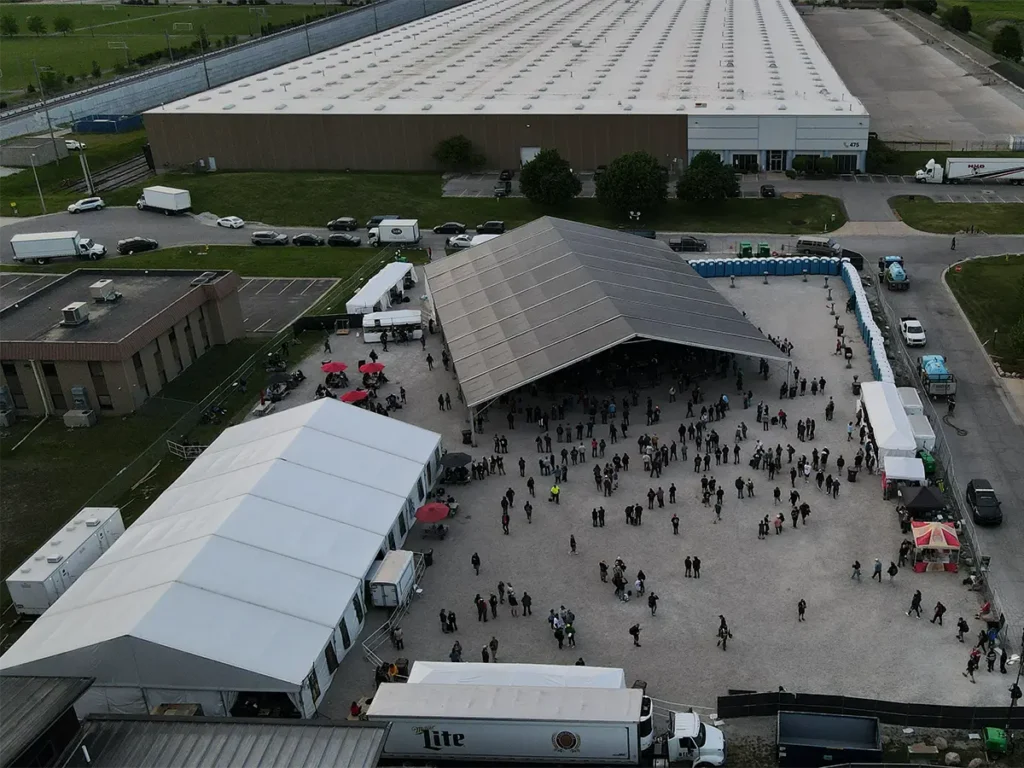 Wide aerial photo of Dark Lord Day with tents, crowds, and vendor stations.